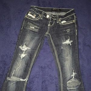 Bootcut jeans with rips